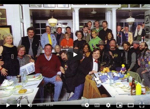 This video still is a link to media clips of the Philadelphia Dumpster Divers compiled by Alex Goldblum